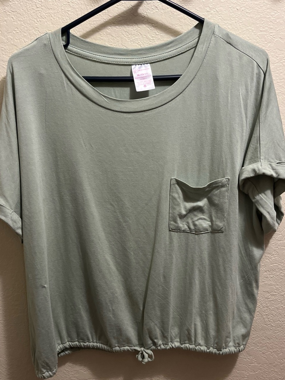 Green Pocket Tee with Drawstring Hem
Green Shorts
